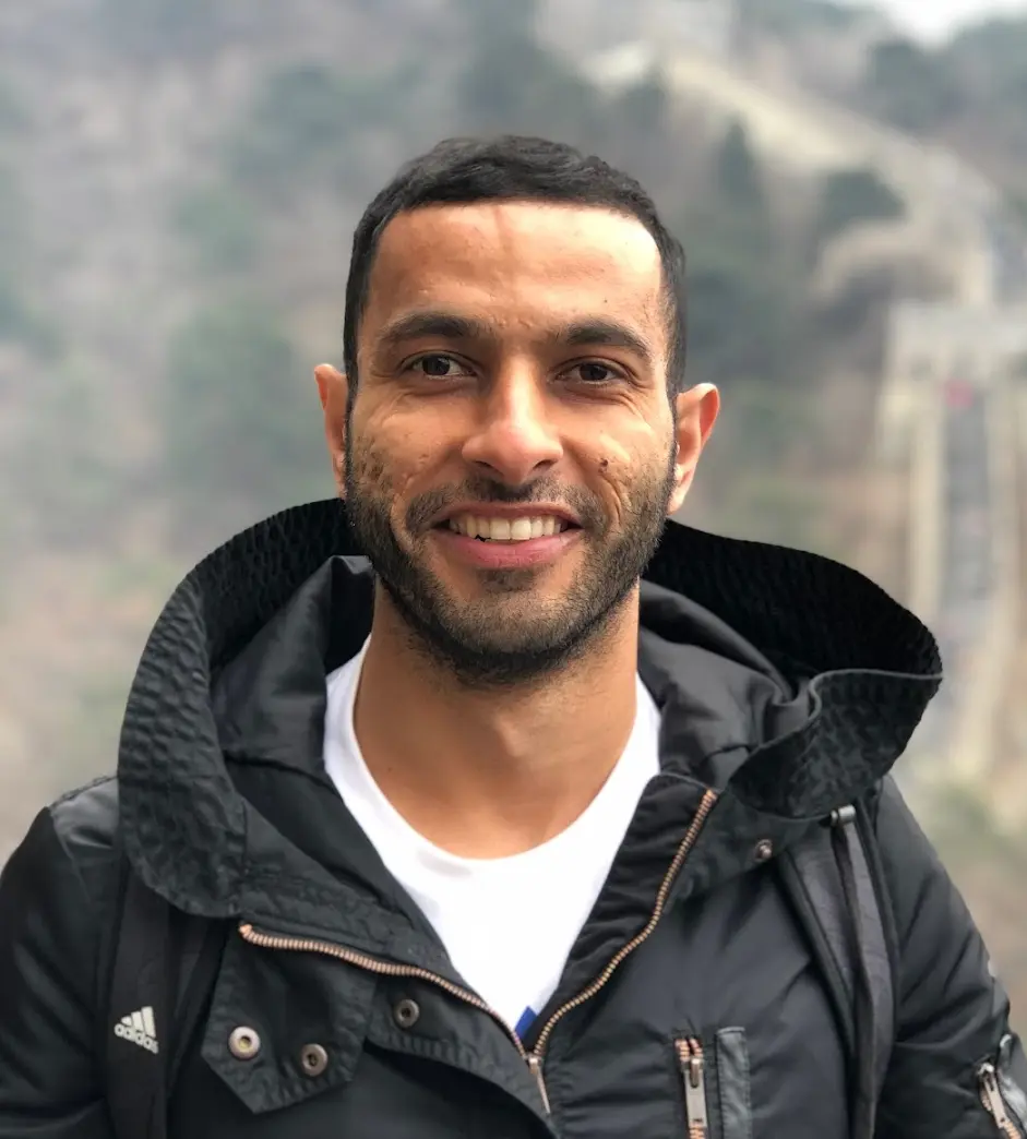 Handsome photo of Peter Mekhaeil on the Great Wall of China